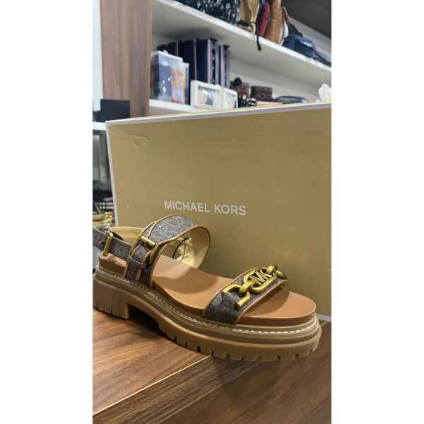 MK KAILEY LUG FLAT SANDAL LUX BROWN