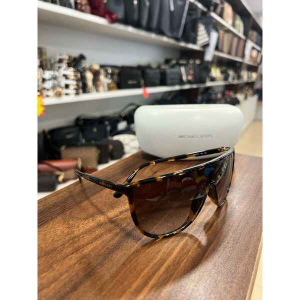 MK BROWN SUNGLASSES ONE LENS