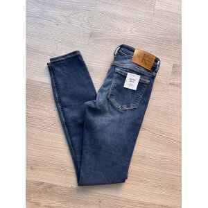 CK DENIM DARK MID RISE SKINNY